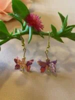 mariposa morada-rosa